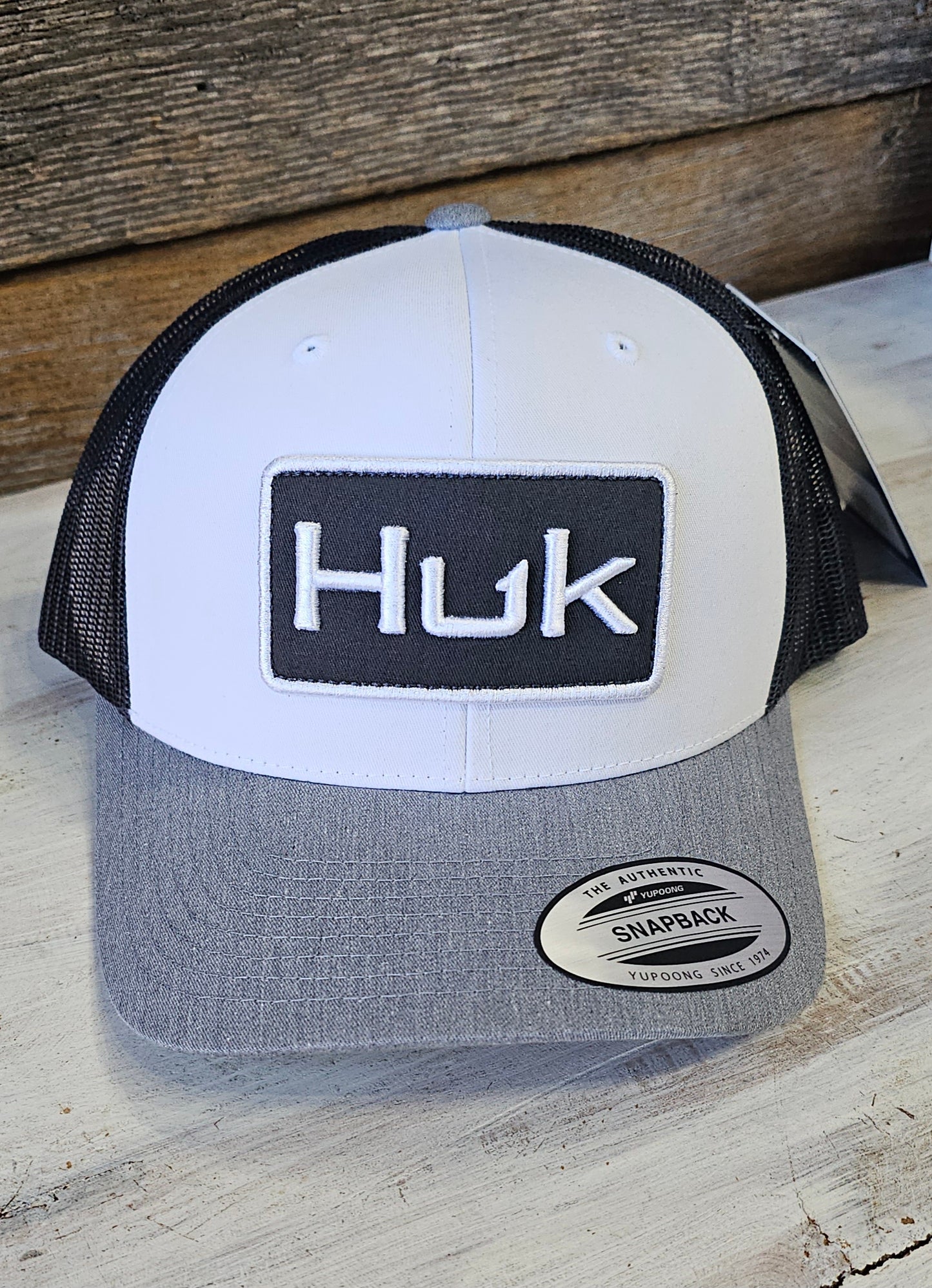 HUK LOGO TRUCKER CAP