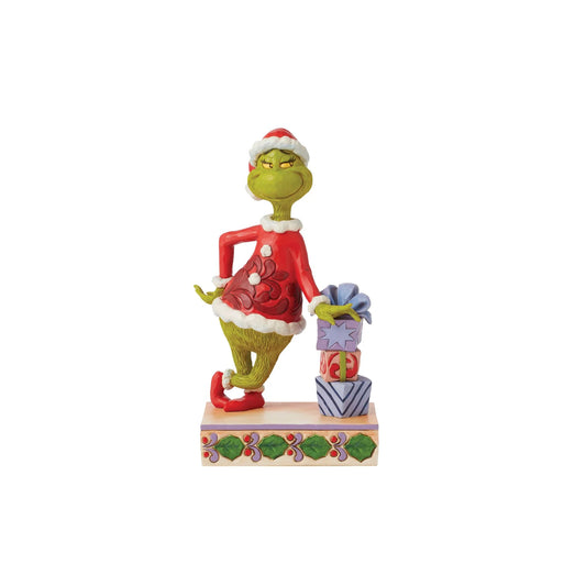 JIM SHORE GRINCH LEANING ON STACKED GIFTS FIGURINE